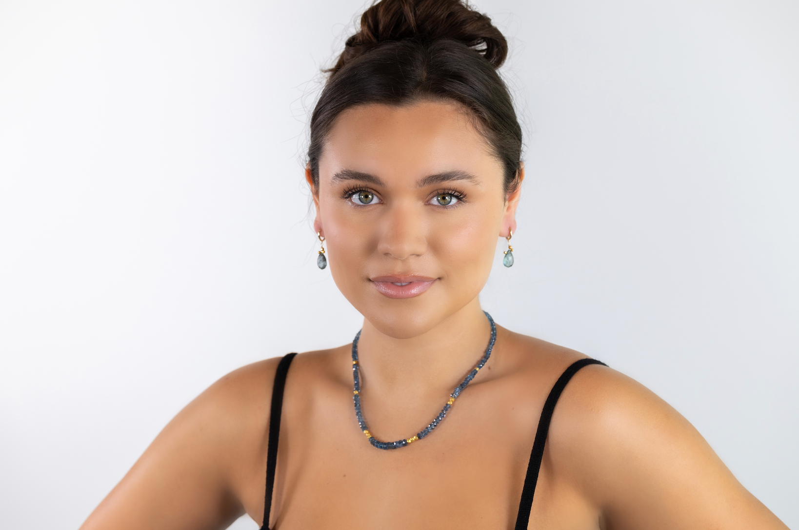 model with necklace and earrings